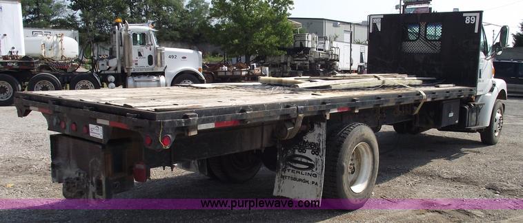 image for item A4034 1999 Sterling L7501 flatbed truck