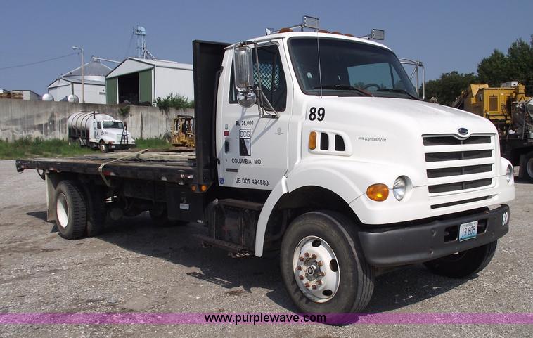 image for item A4034 1999 Sterling L7501 flatbed truck