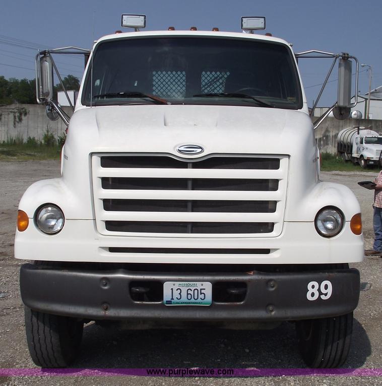 image for item A4034 1999 Sterling L7501 flatbed truck