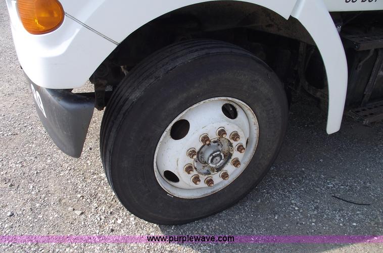 image for item A4034 1999 Sterling L7501 flatbed truck