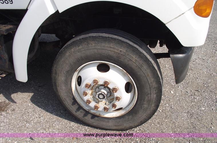 image for item A4034 1999 Sterling L7501 flatbed truck