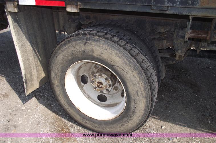 image for item A4034 1999 Sterling L7501 flatbed truck