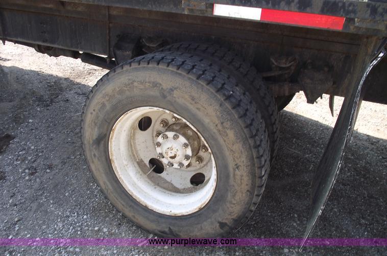 image for item A4034 1999 Sterling L7501 flatbed truck