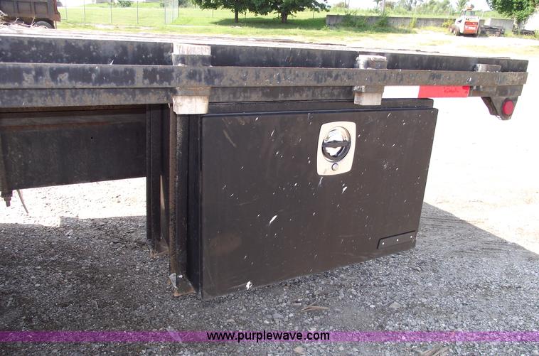 image for item A4034 1999 Sterling L7501 flatbed truck