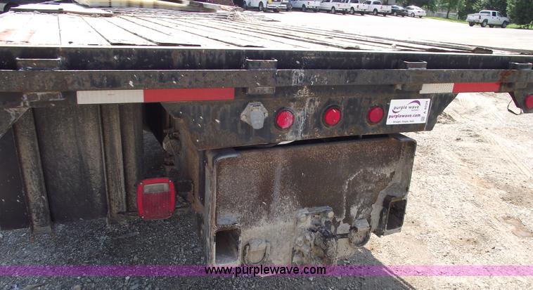 image for item A4034 1999 Sterling L7501 flatbed truck