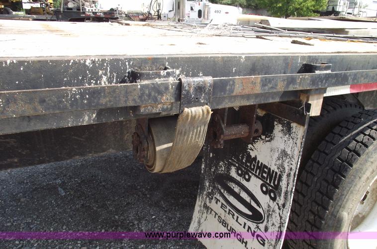image for item A4034 1999 Sterling L7501 flatbed truck