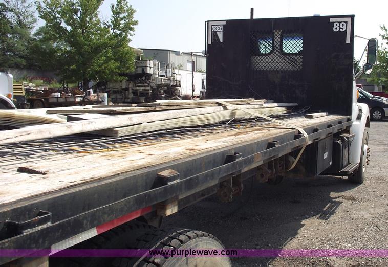 image for item A4034 1999 Sterling L7501 flatbed truck