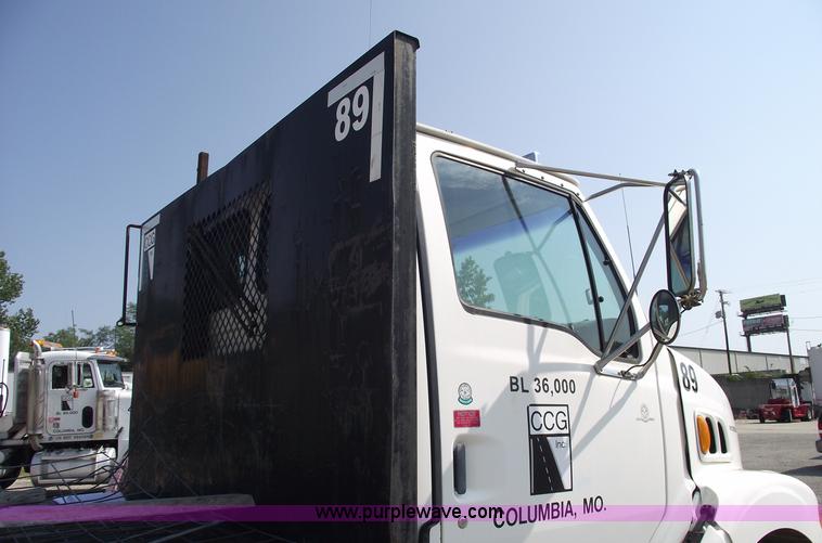 image for item A4034 1999 Sterling L7501 flatbed truck