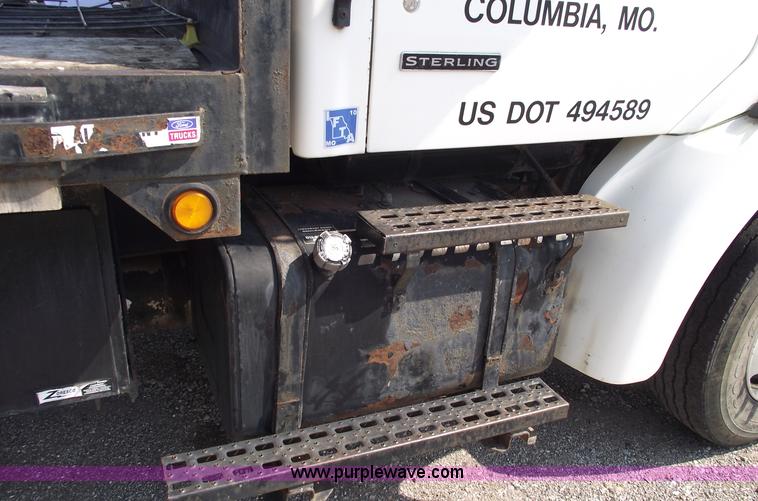 image for item A4034 1999 Sterling L7501 flatbed truck