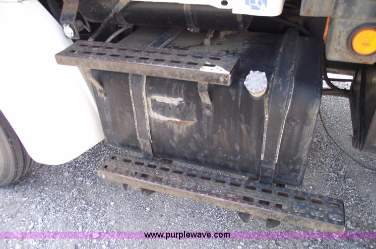 image for item A4034 1999 Sterling L7501 flatbed truck