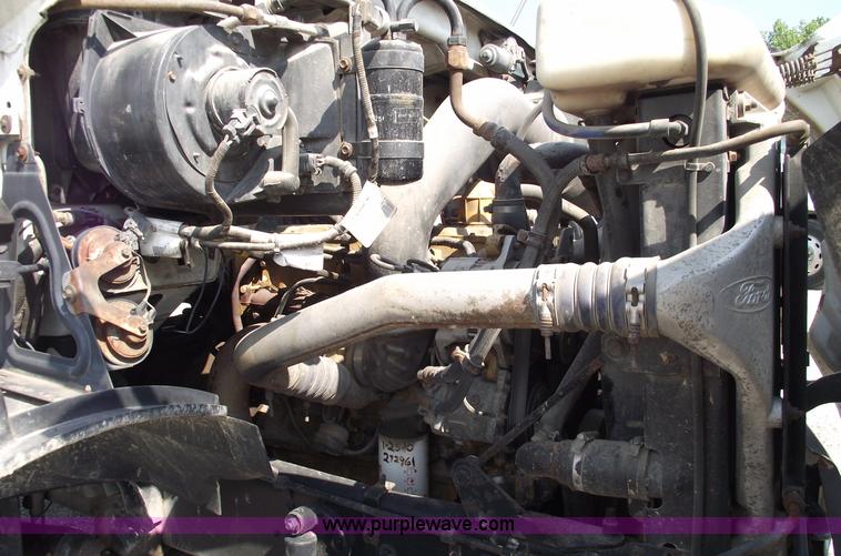 image for item A4034 1999 Sterling L7501 flatbed truck