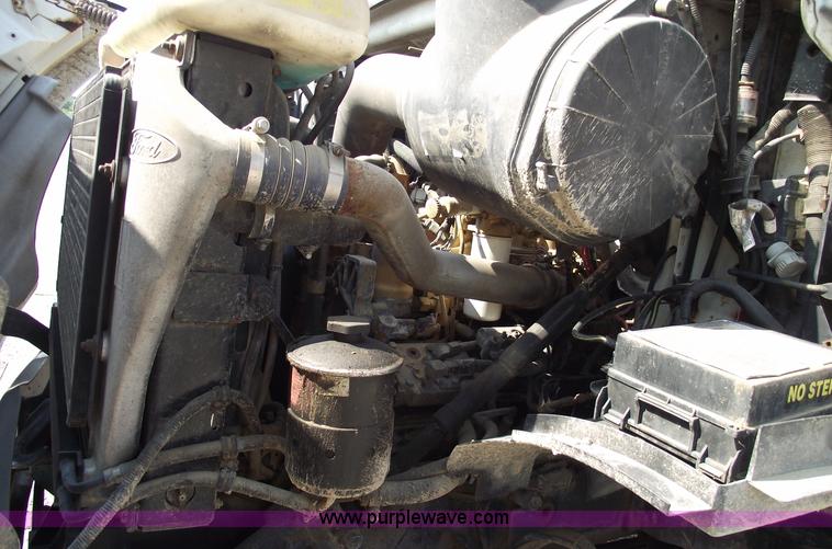 image for item A4034 1999 Sterling L7501 flatbed truck