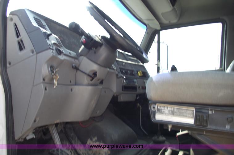 image for item A4034 1999 Sterling L7501 flatbed truck