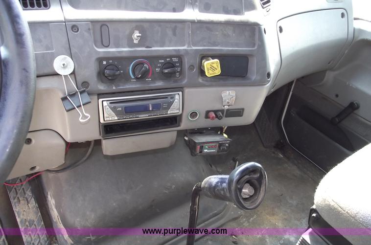 image for item A4034 1999 Sterling L7501 flatbed truck