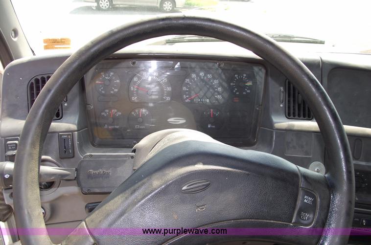 image for item A4034 1999 Sterling L7501 flatbed truck