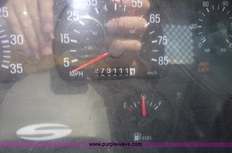 image for item A4034 1999 Sterling L7501 flatbed truck