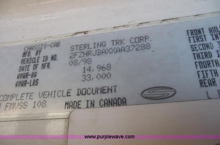 image for item A4034 1999 Sterling L7501 flatbed truck