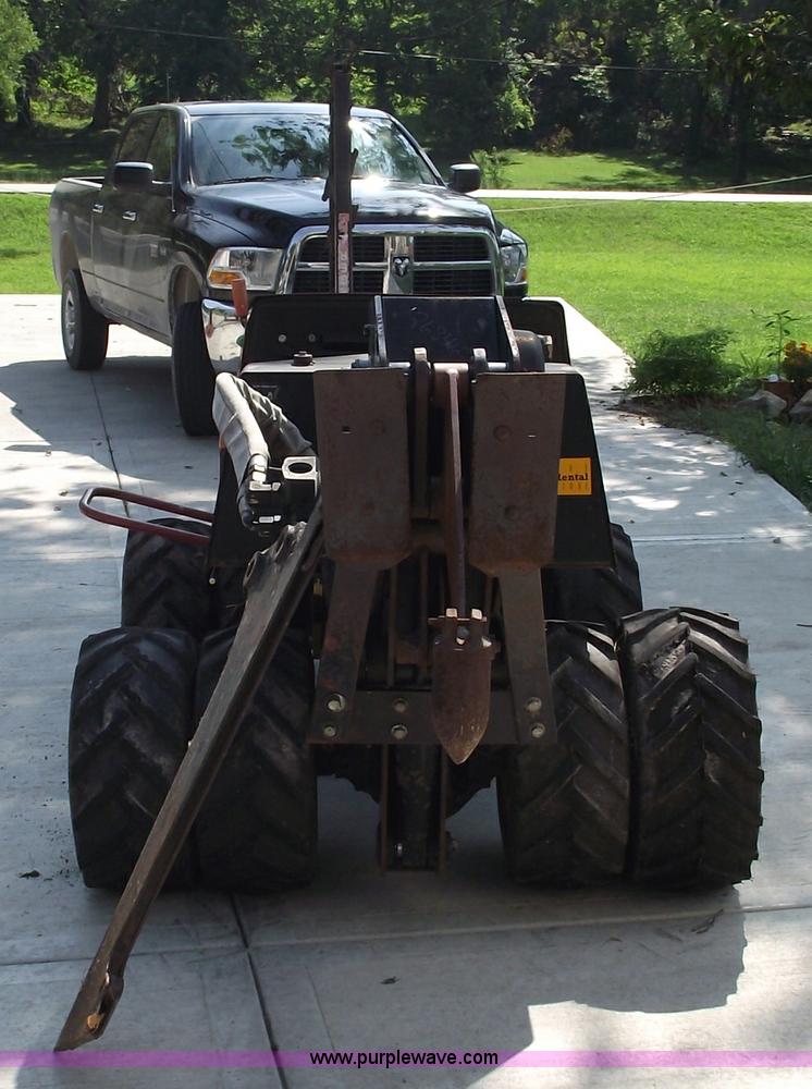 image for item A4067 2004 Ditch Witch 410SX vibratory plow