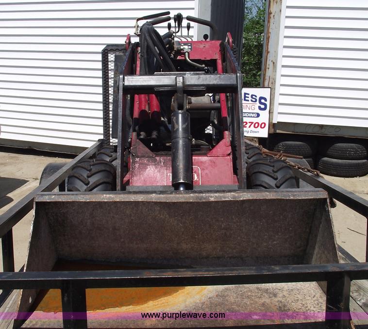 image for item A4074 Toro Dingo 220 walk behind skid steer