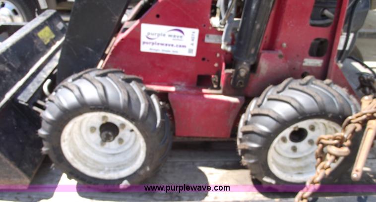 image for item A4074 Toro Dingo 220 walk behind skid steer