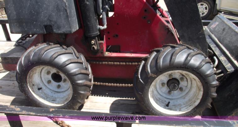 image for item A4074 Toro Dingo 220 walk behind skid steer