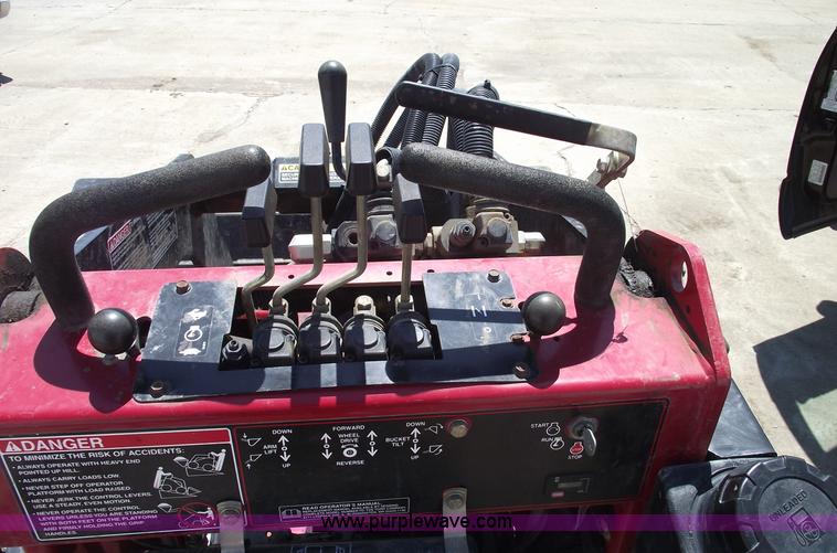 image for item A4074 Toro Dingo 220 walk behind skid steer