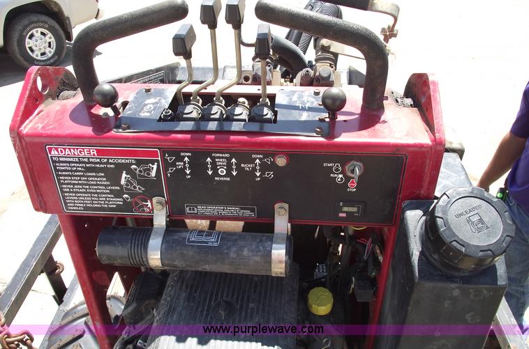 image for item A4074 Toro Dingo 220 walk behind skid steer