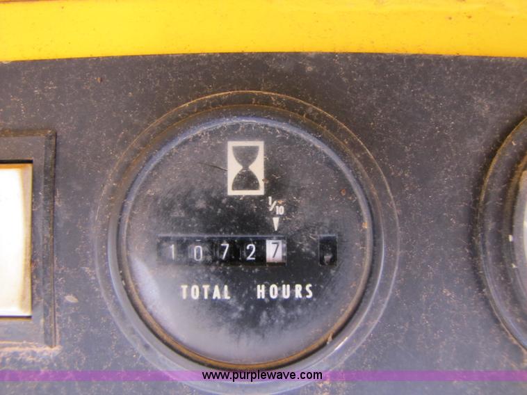 image for item A4644 1987 John Deere 575 skid steer