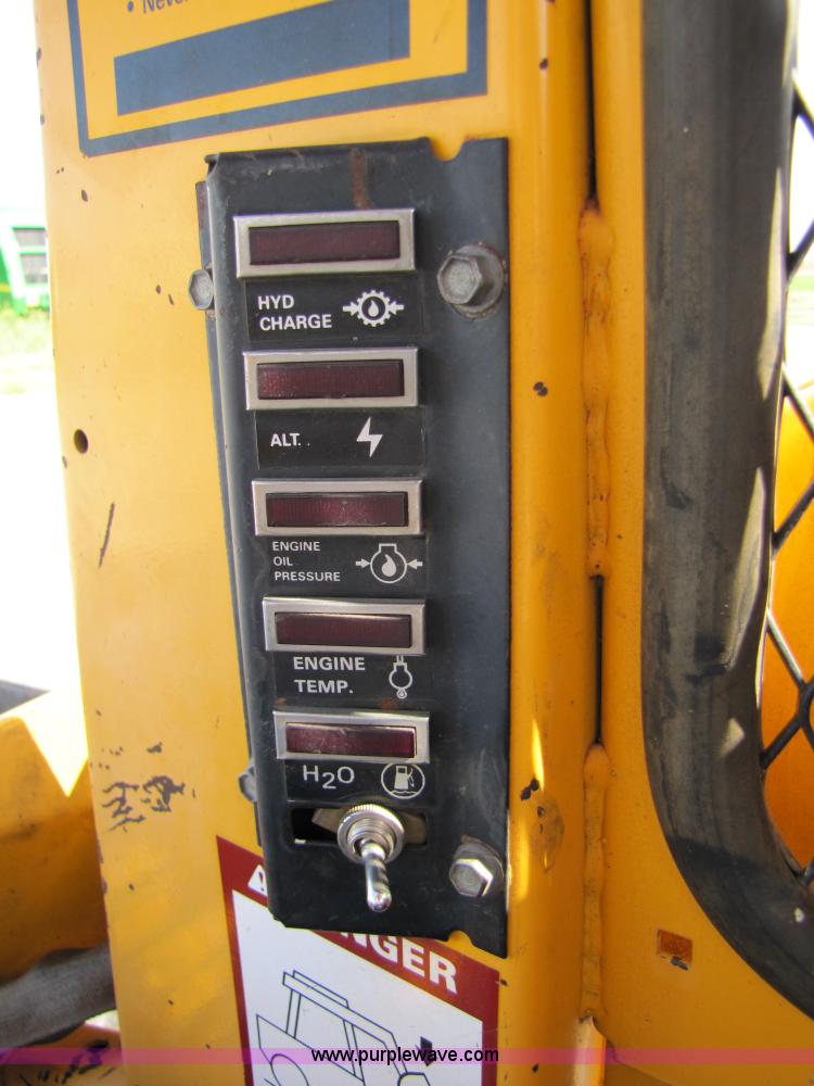 image for item A4644 1987 John Deere 575 skid steer