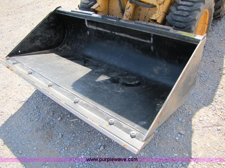 image for item A4644 1987 John Deere 575 skid steer