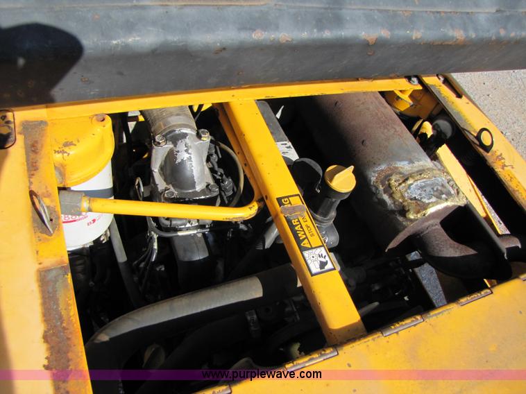 image for item A4644 1987 John Deere 575 skid steer