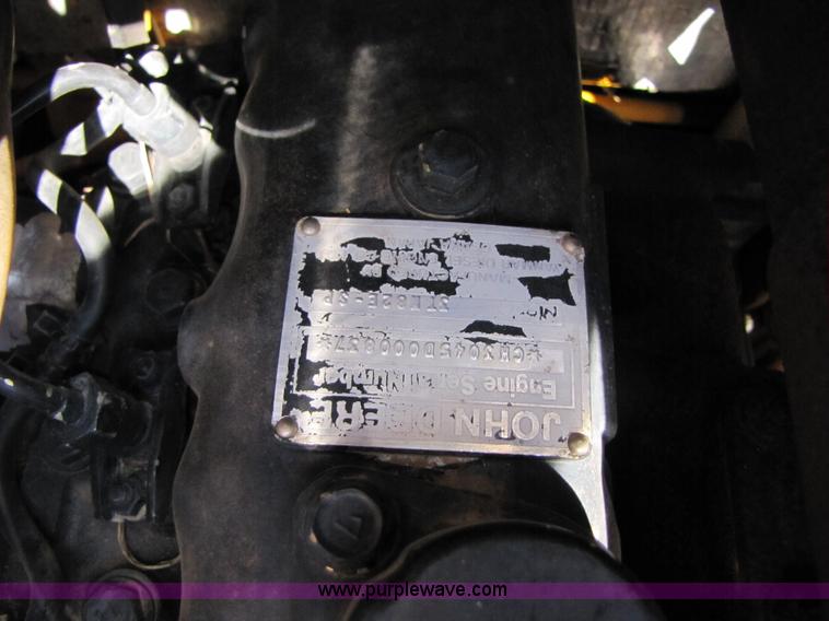 image for item A4644 1987 John Deere 575 skid steer