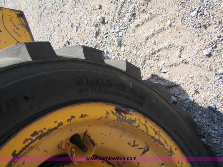 image for item A4644 1987 John Deere 575 skid steer