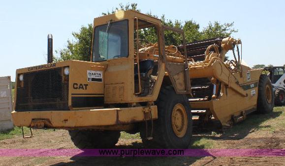 image for item F9754 Caterpillar 615 paddle scraper