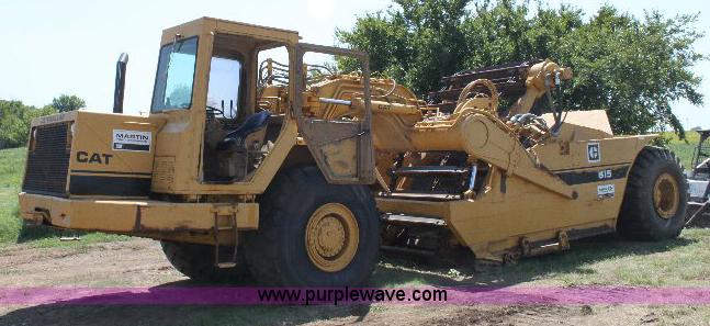 image for item F9754 Caterpillar 615 paddle scraper