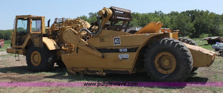 image for item F9754 Caterpillar 615 paddle scraper