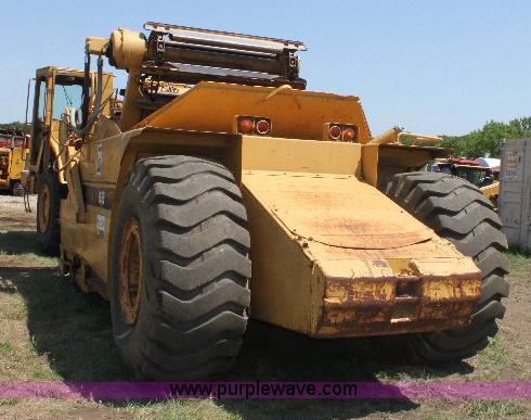 image for item F9754 Caterpillar 615 paddle scraper