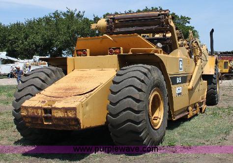 image for item F9754 Caterpillar 615 paddle scraper