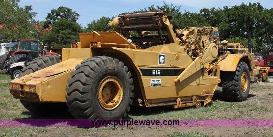 image for item F9754 Caterpillar 615 paddle scraper