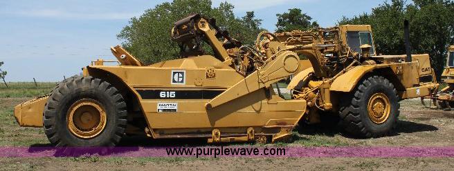 image for item F9754 Caterpillar 615 paddle scraper