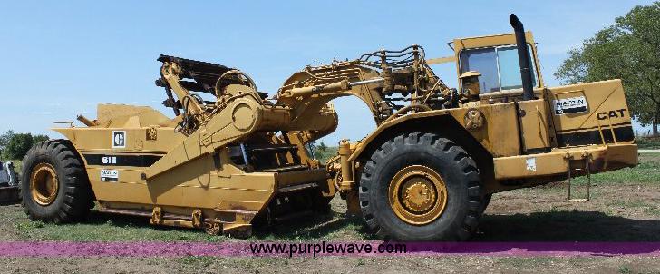 image for item F9754 Caterpillar 615 paddle scraper