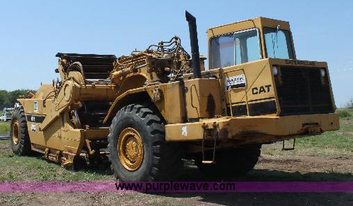 image for item F9754 Caterpillar 615 paddle scraper