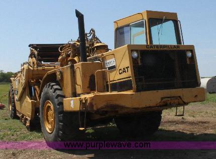 image for item F9754 Caterpillar 615 paddle scraper