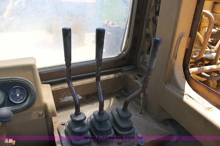 image for item F9754 Caterpillar 615 paddle scraper