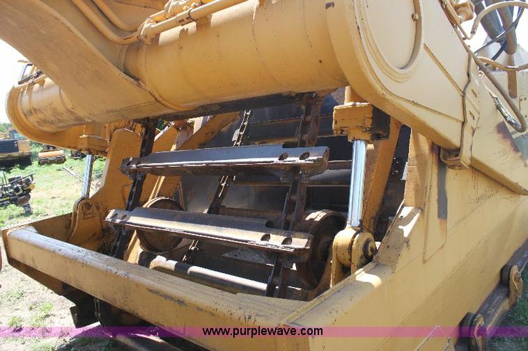 image for item F9754 Caterpillar 615 paddle scraper