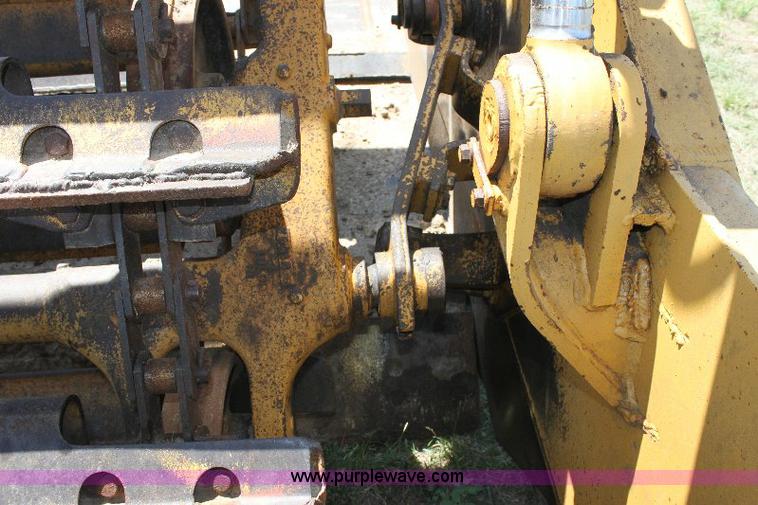 image for item F9754 Caterpillar 615 paddle scraper