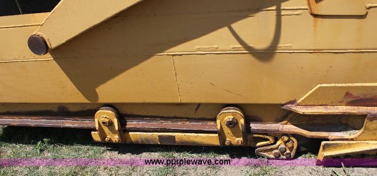 image for item F9754 Caterpillar 615 paddle scraper
