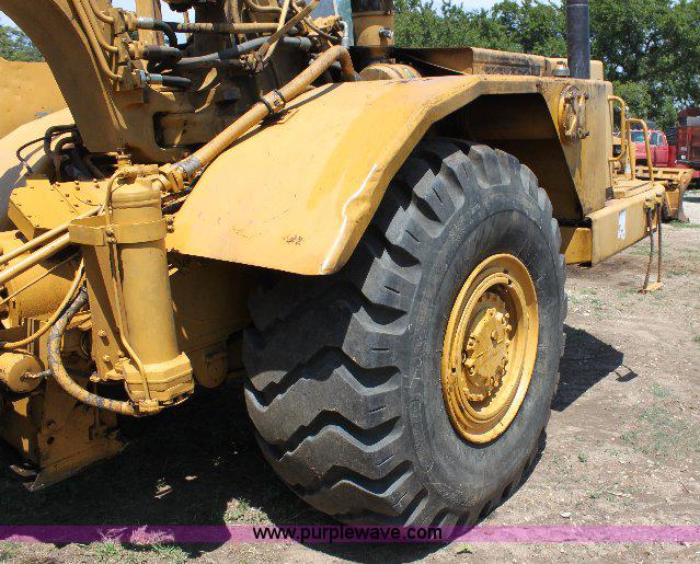 image for item F9754 Caterpillar 615 paddle scraper