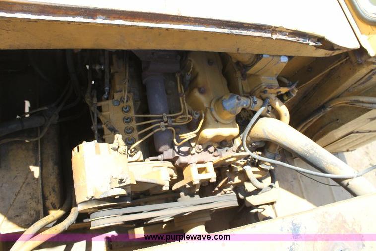 image for item F9754 Caterpillar 615 paddle scraper