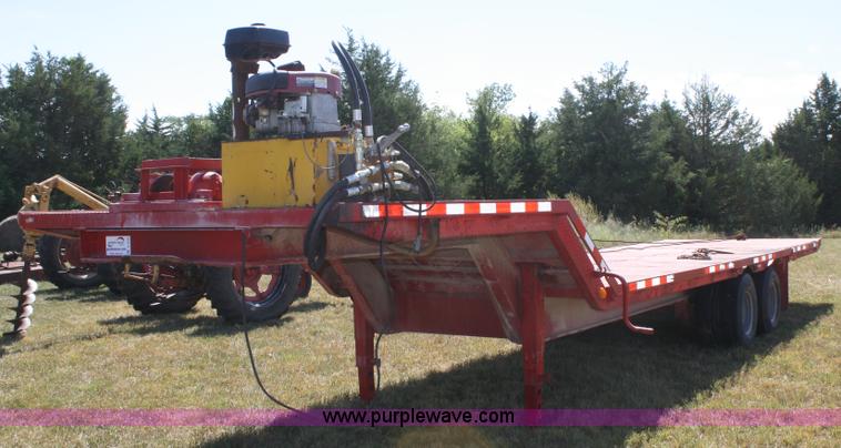 image for item A2303 1984 shop built 35' trailer with hydraulic tail